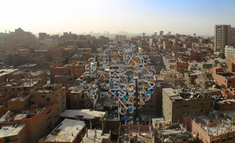  Barrio Manshiyat Naser (El Cairo) – “Calligraffiti urbana que une edificios y comunidad”